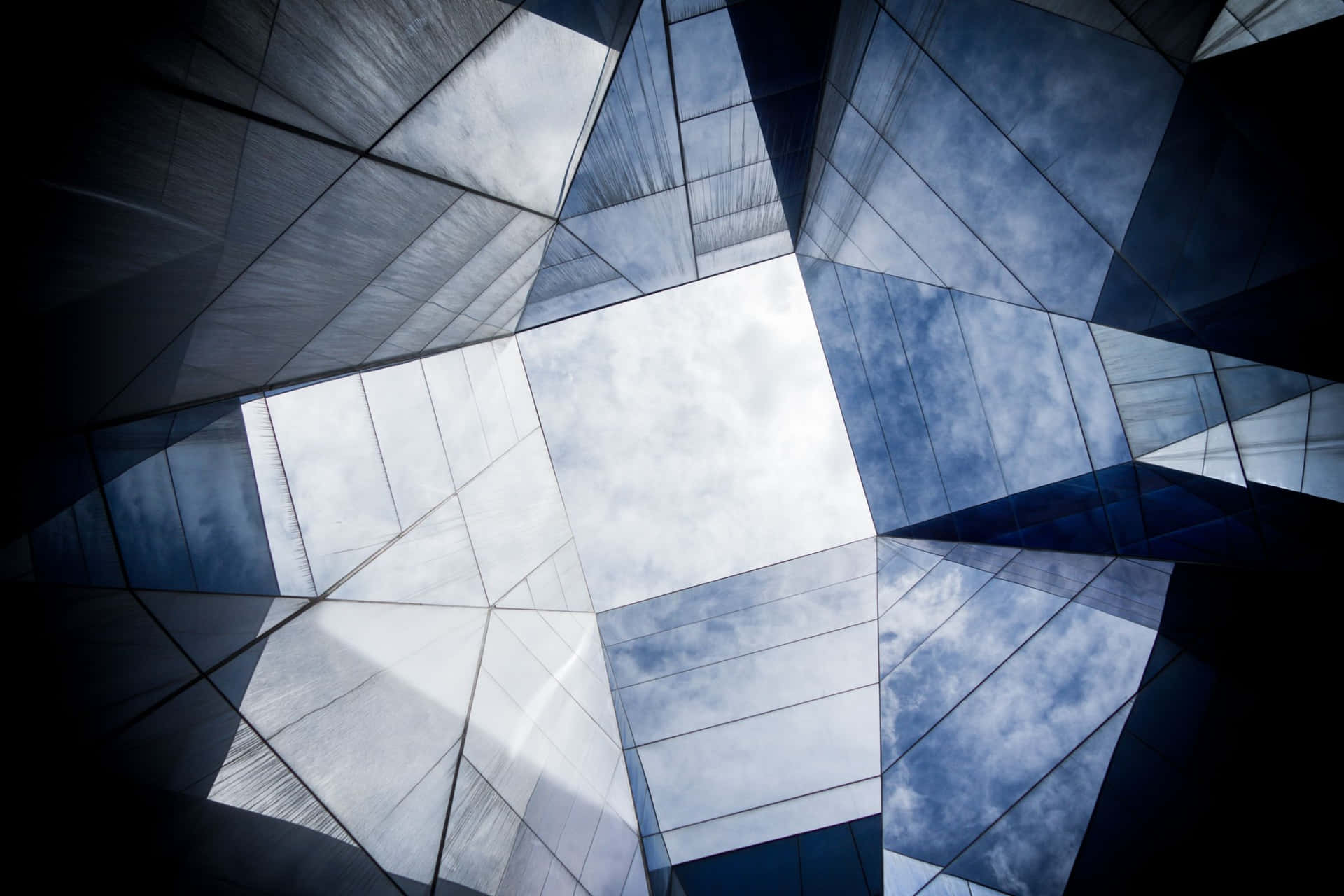 a building with blue and white glass Wallpaper