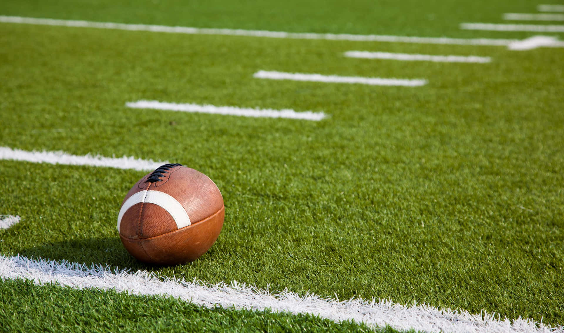 2440x1440 Football Background Brown Rugby Ball On The Grass