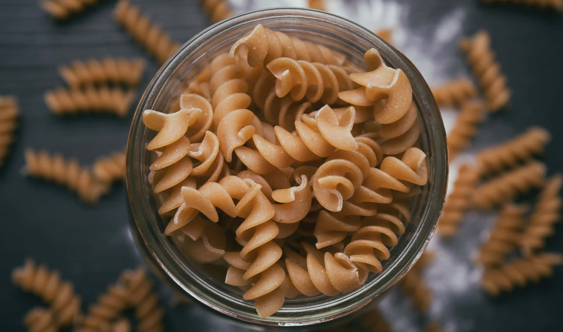 A Jar Of Pasta Sitting On A Table