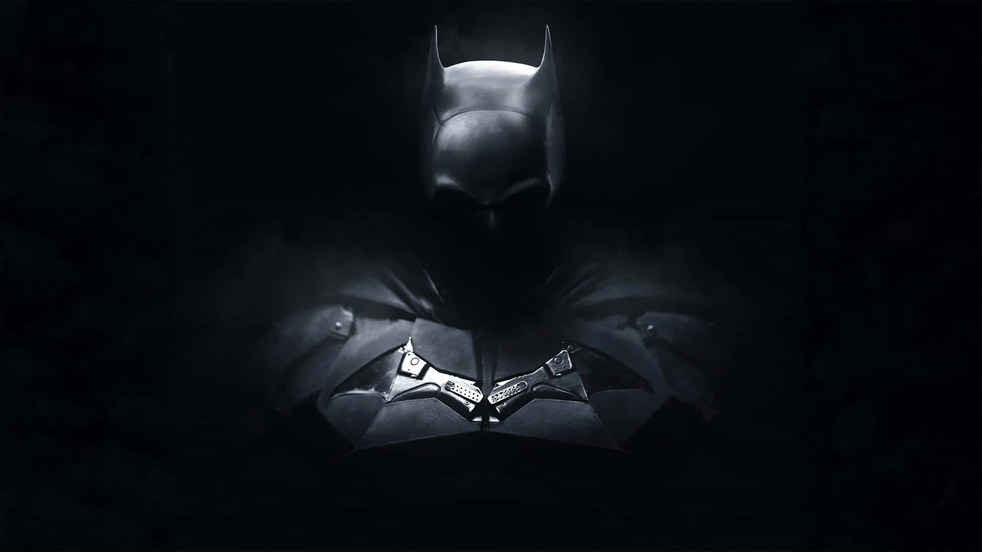 The Dark Knight looks out over Gotham City Wallpaper
