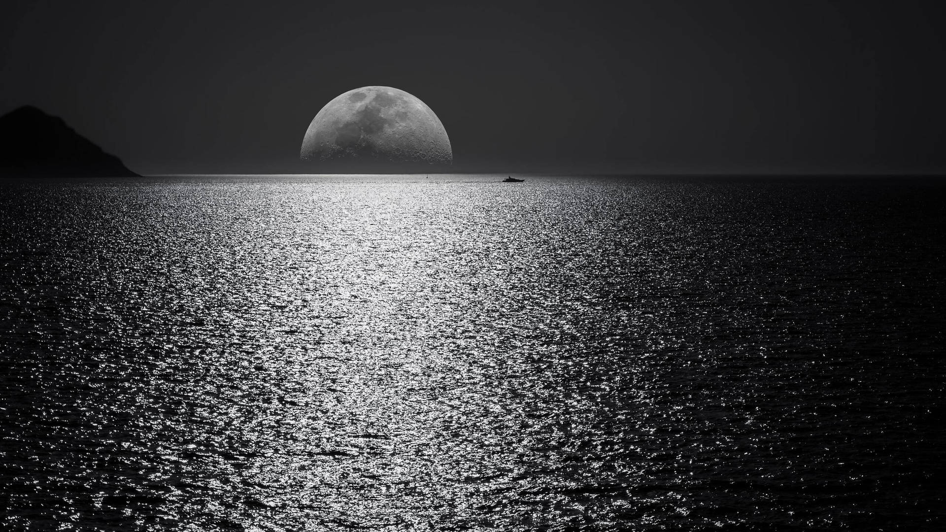 2560 X 1440 Large Moon At Sea Picture