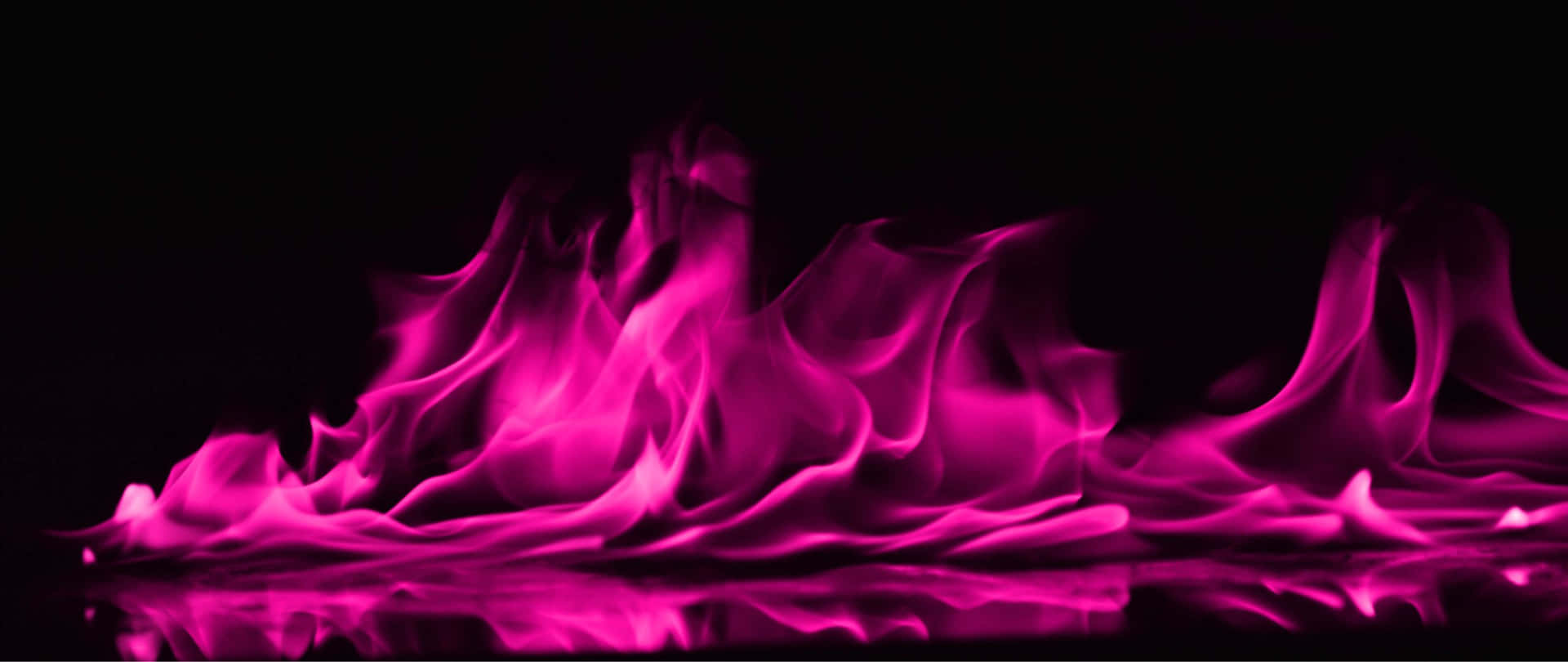 A Black Background With Pink Flames