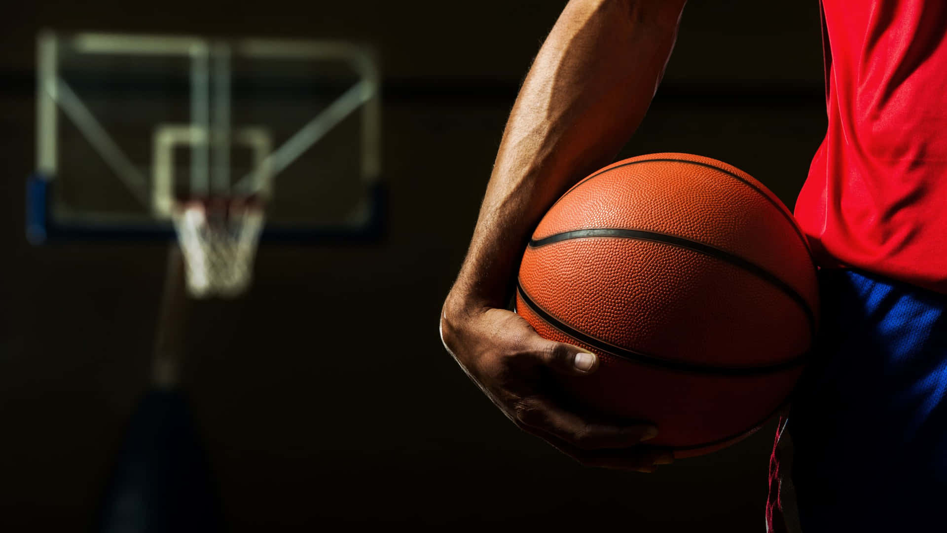 Basketballspiller tager et tre-points skud Wallpaper