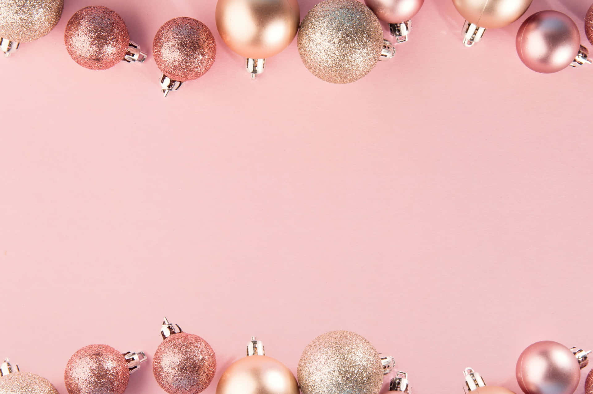 Christmas Balls On Pink Background With Copy Space Wallpaper