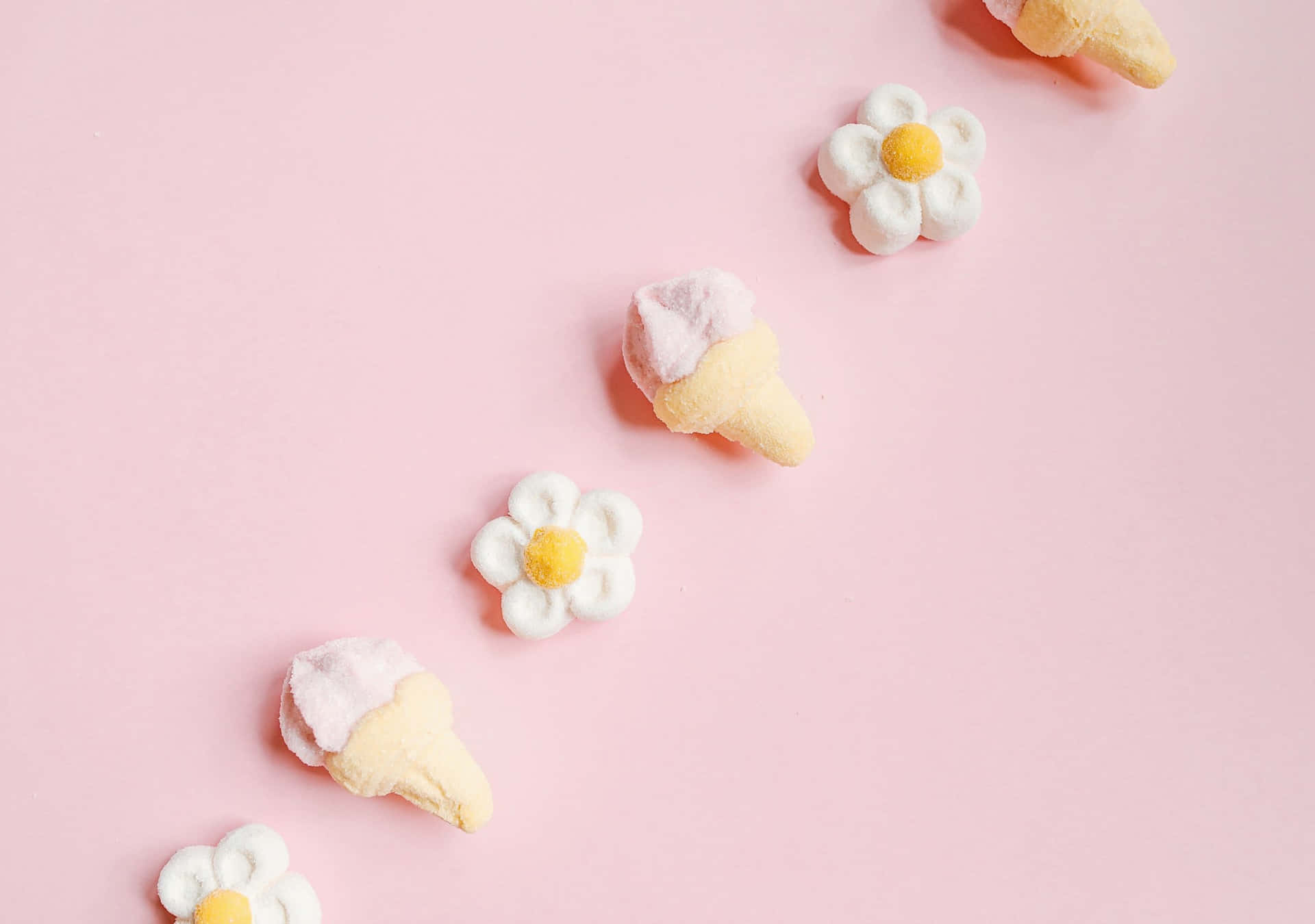 Ice Cream Cones With Flowers On A Pink Background Wallpaper