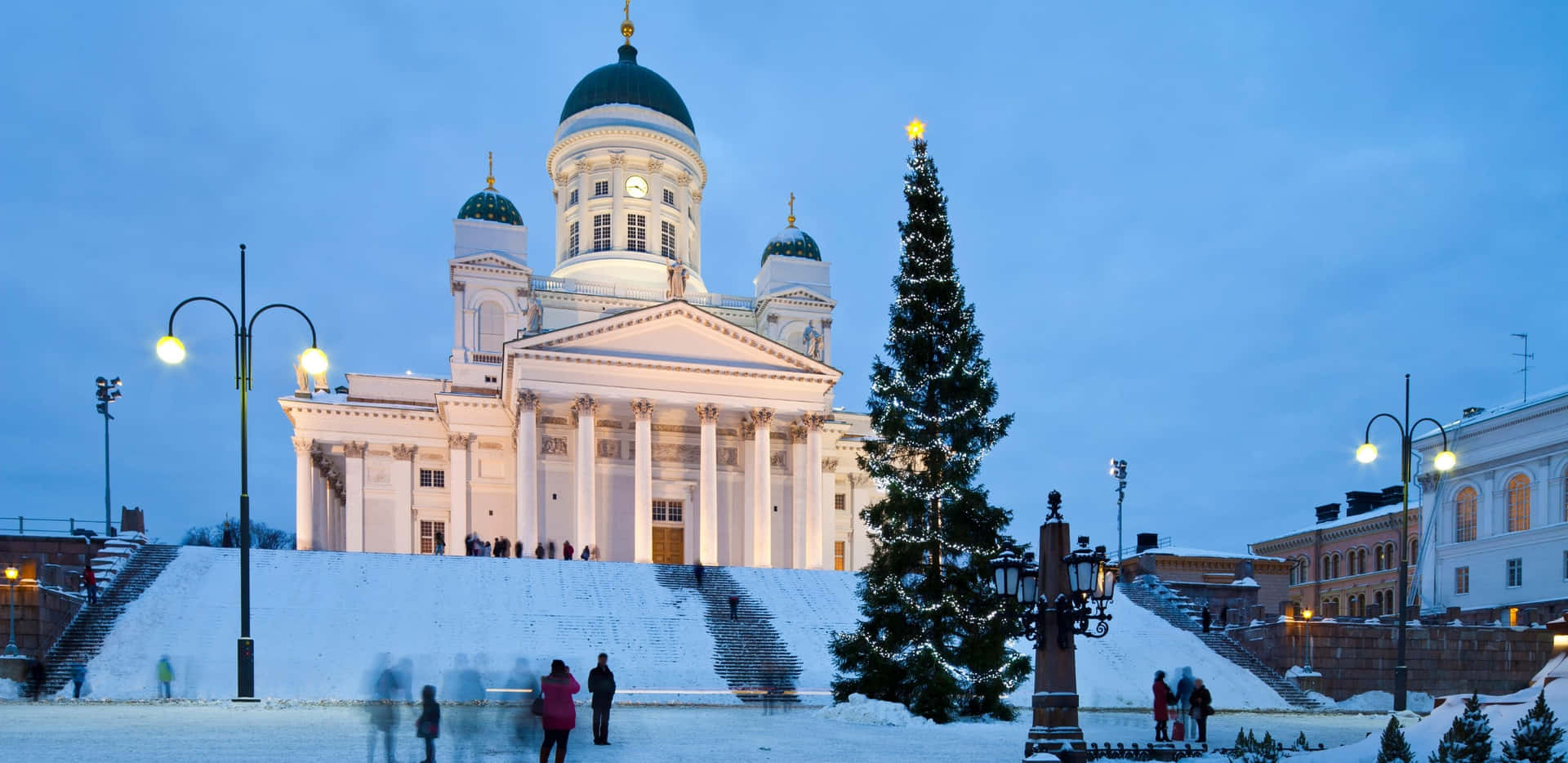 A Church With A Large White Dome And A Snow Covered Square Wallpaper