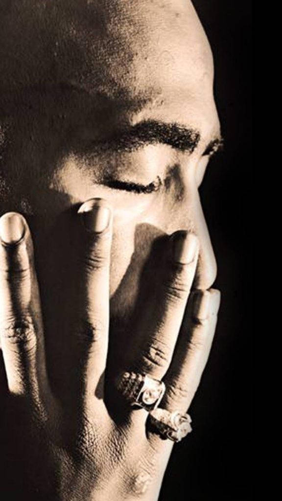 2pac Closed Eyes Holding Face Wallpaper
