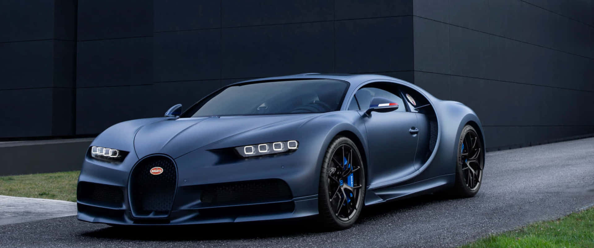 A sleek angle of a Bugatti showcased at a motorsport event.