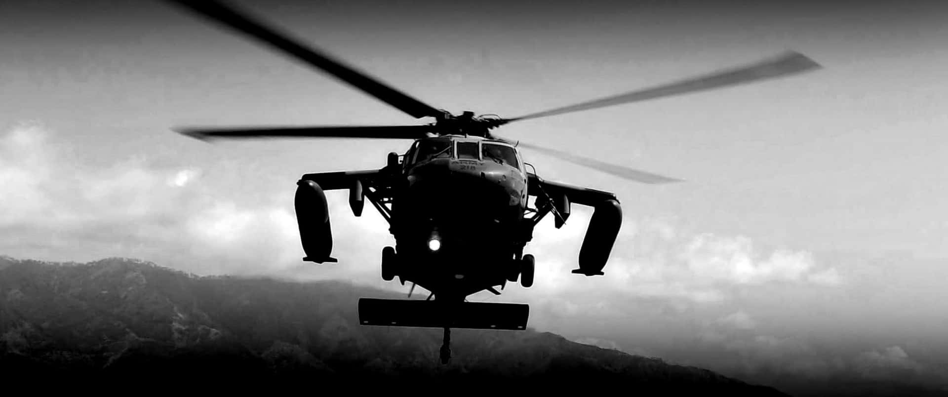 Bildtvå Helikoptrar Som Flyger I Luften