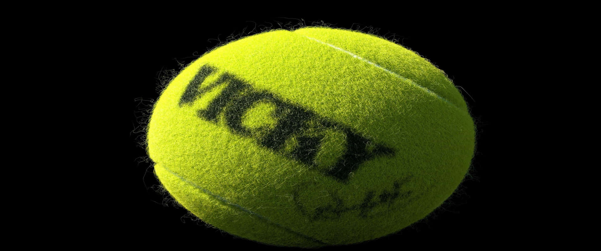 A Tennis Ball With The Word Victor On It