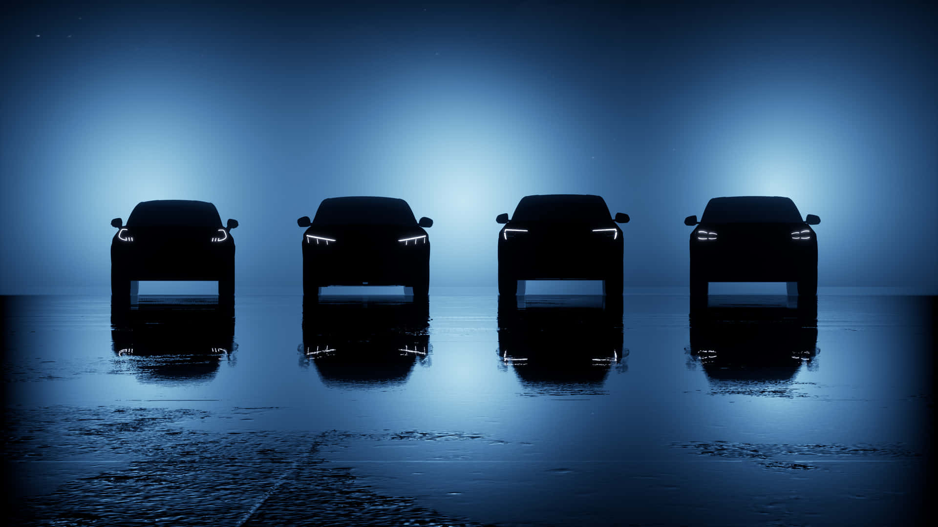 Fire SUVer står i række i et mørkt rum.