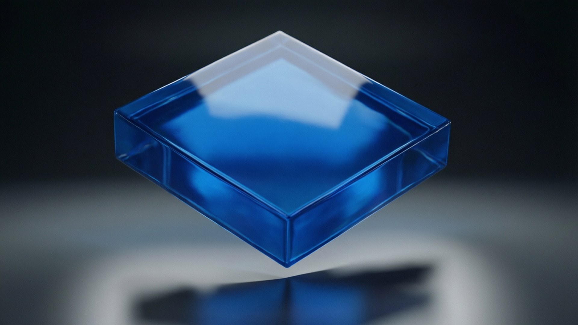 Un quadrato blu 3D realistico che fluttua con riflessi.