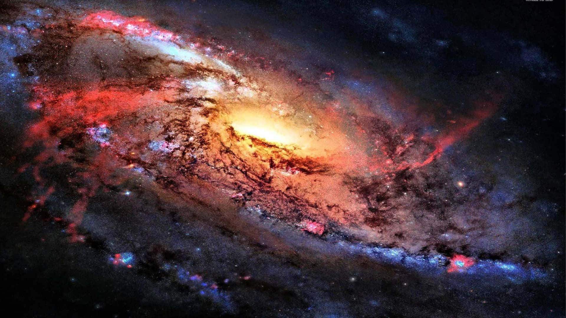 A breathtaking 3D view of an illuminated galaxy deep in outer space. Wallpaper