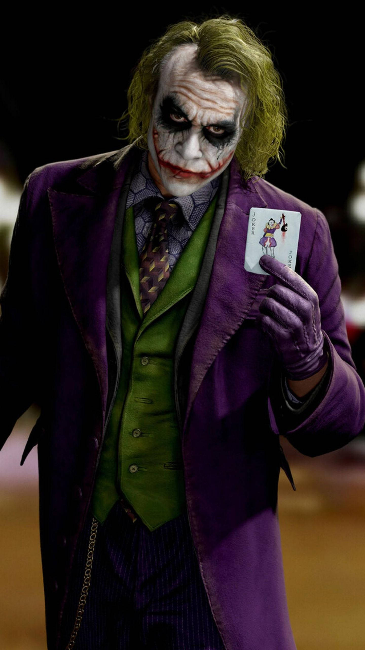 3d Joker Iphone Holding Up Card Wallpaper