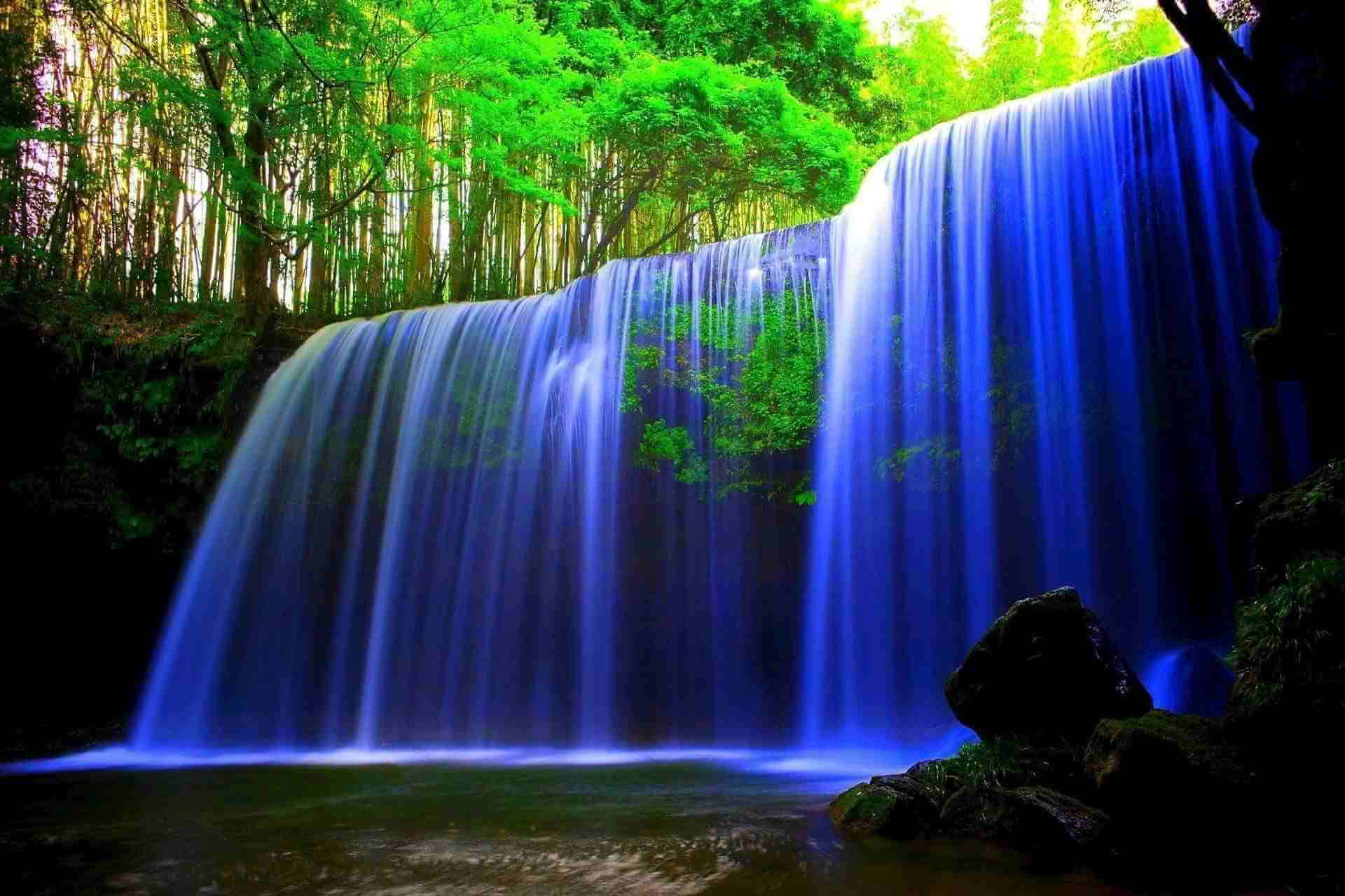 Stunning 3D Waterfall in a Lush Forest Wallpaper