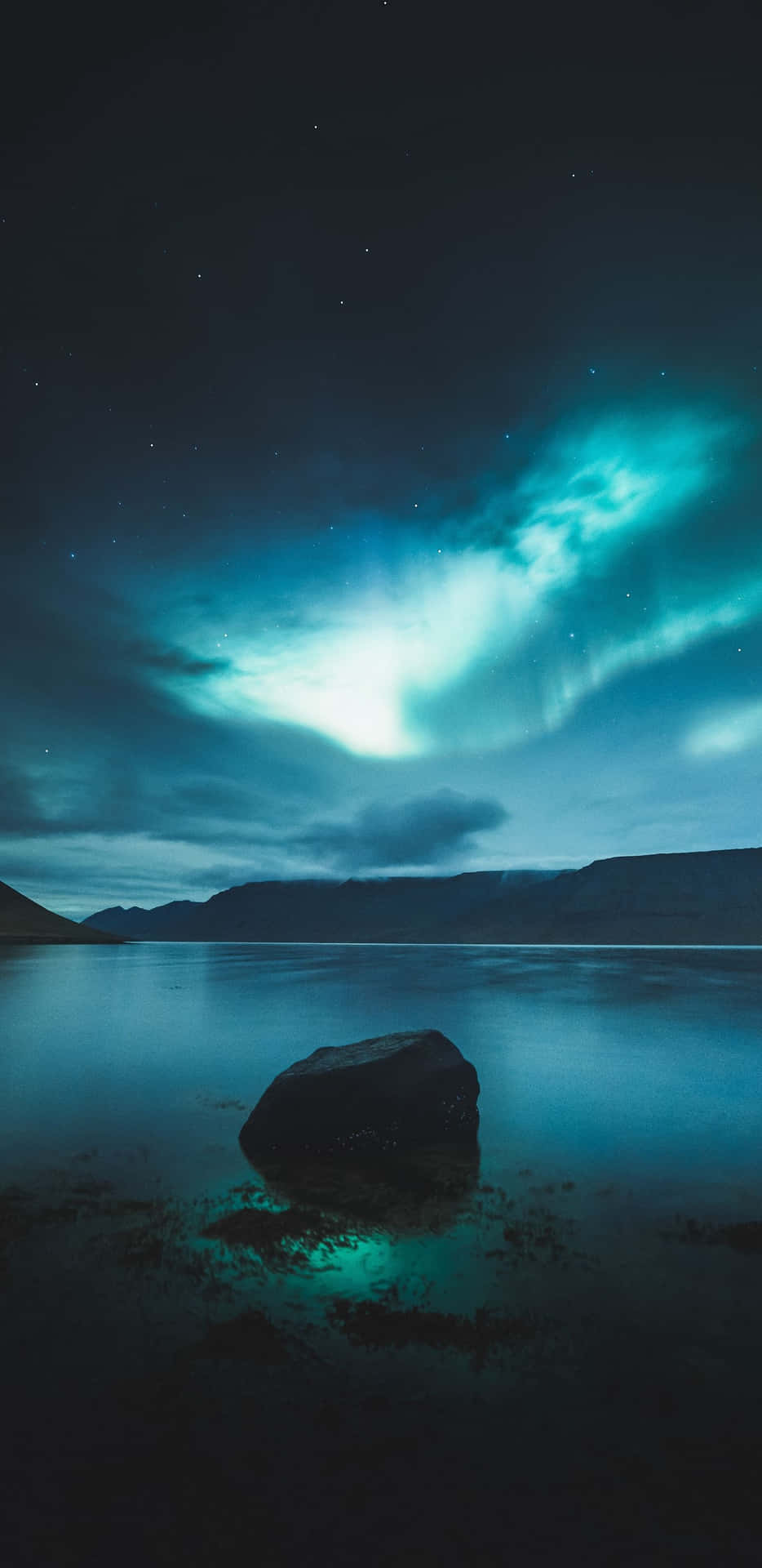 the aurora borealis over a lake