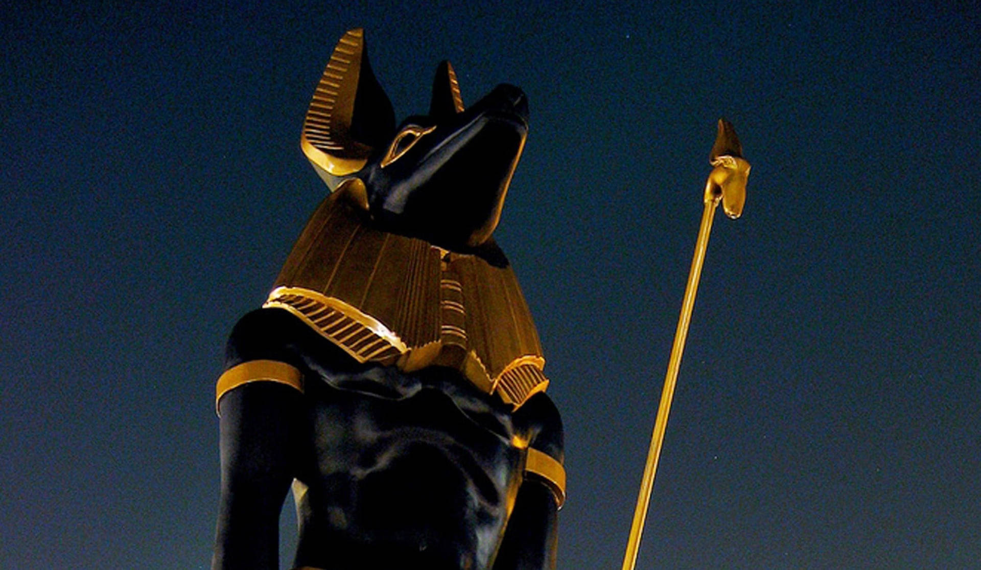 4K Anubis Statue At Night Wallpaper