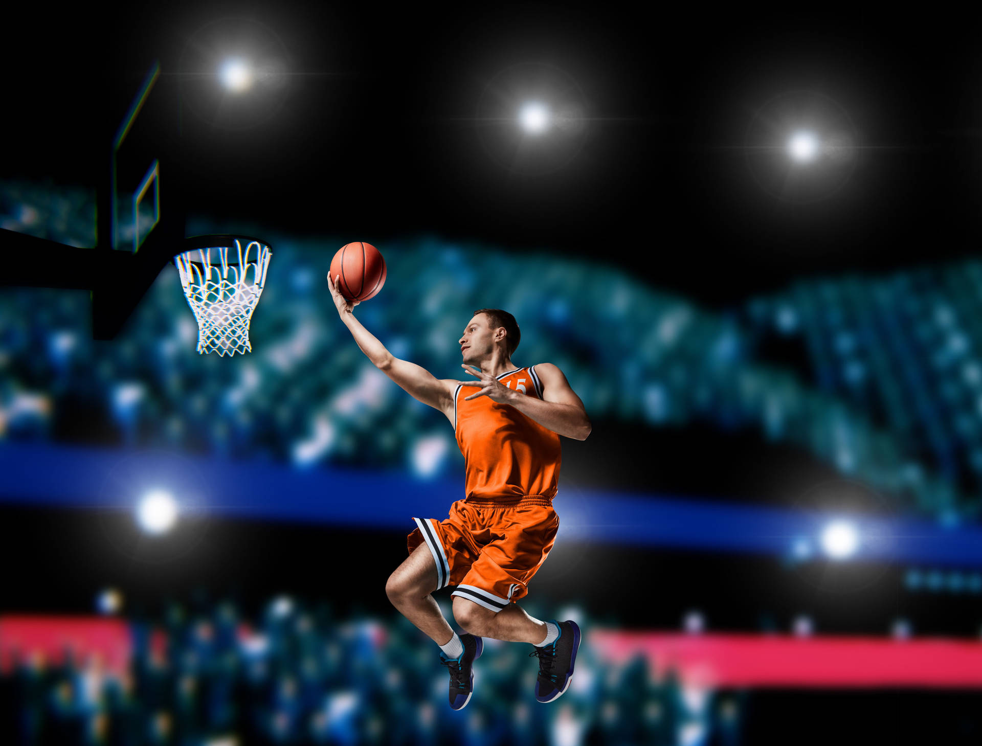 4k Basketball Player In Orange Jersey Wallpaper