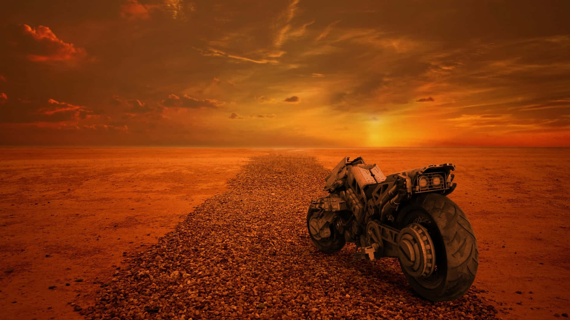 A Motorcycle Is Sitting On A Dirt Road In The Desert