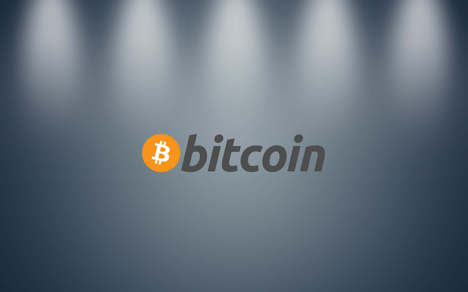 Bitcoinlogo Auf Einem Grauen Hintergrund Wallpaper