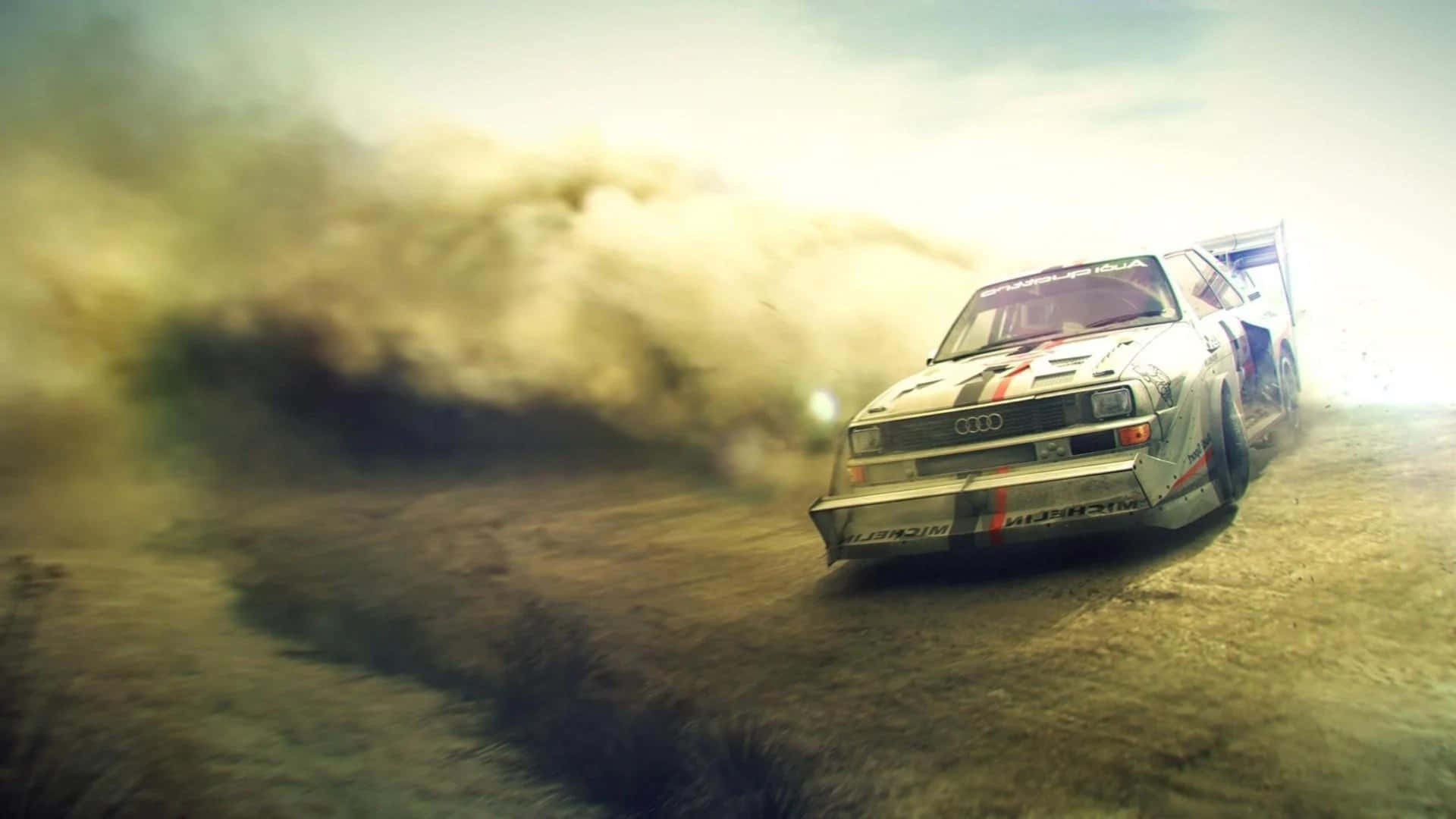 A Dirt Rally Car Driving Through A Dirt Road