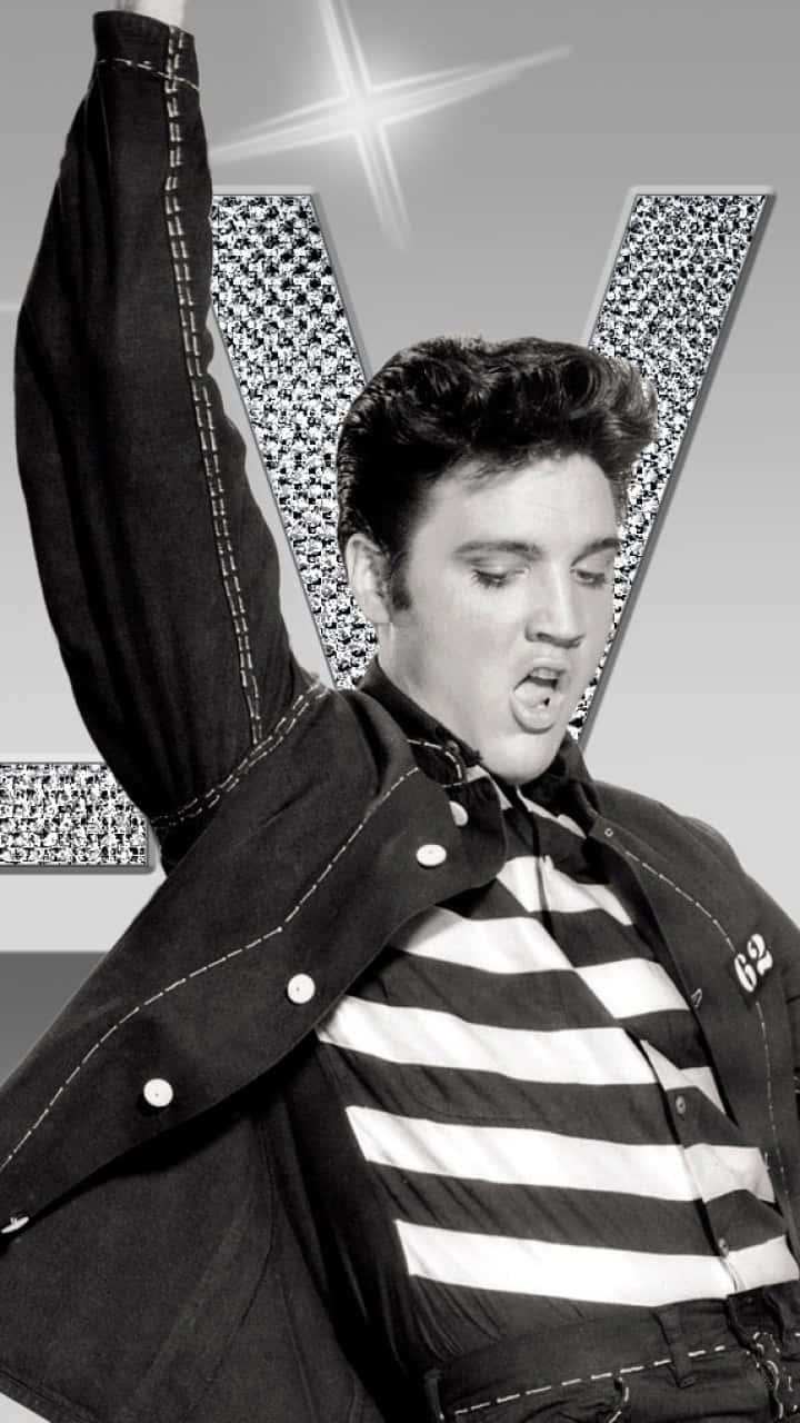 4k Elvis Raising His Hand Wallpaper