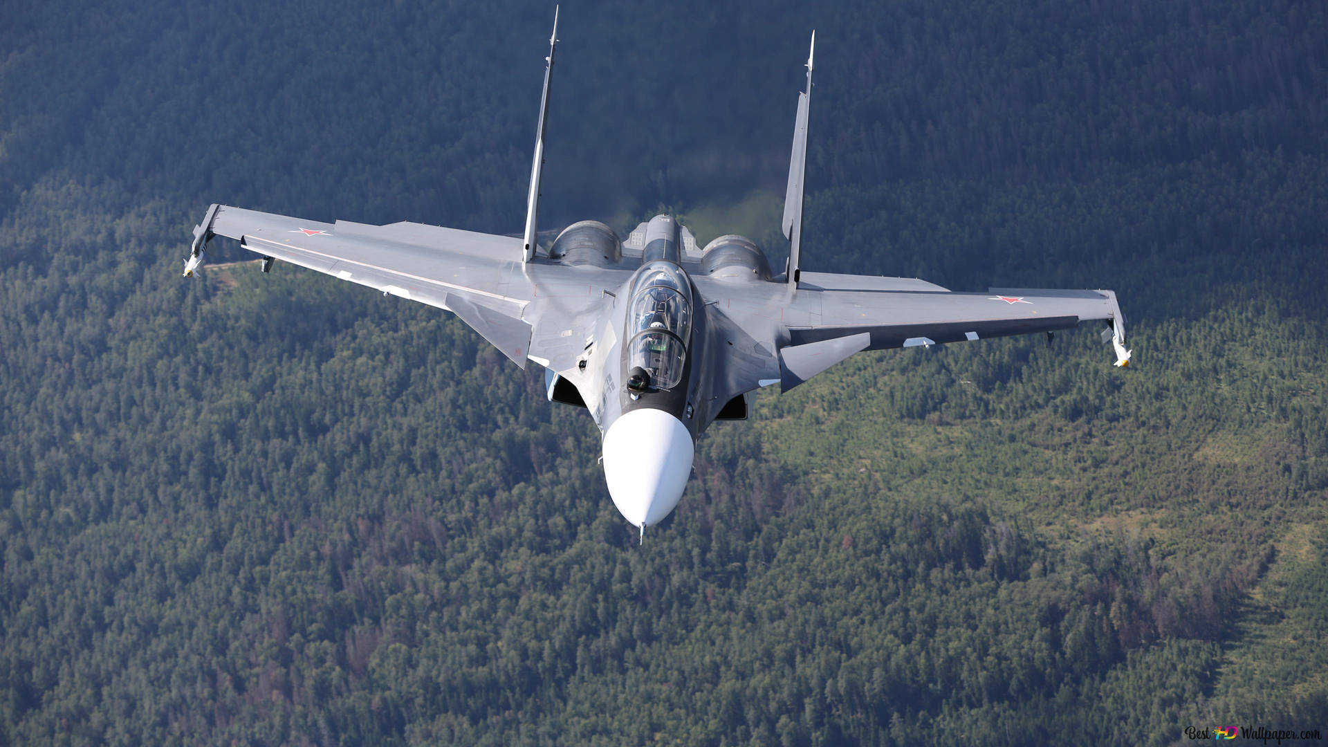 Einmilitärisches F/a-18 Hornet Kampfflugzeug Fliegt Am Himmel Wallpaper