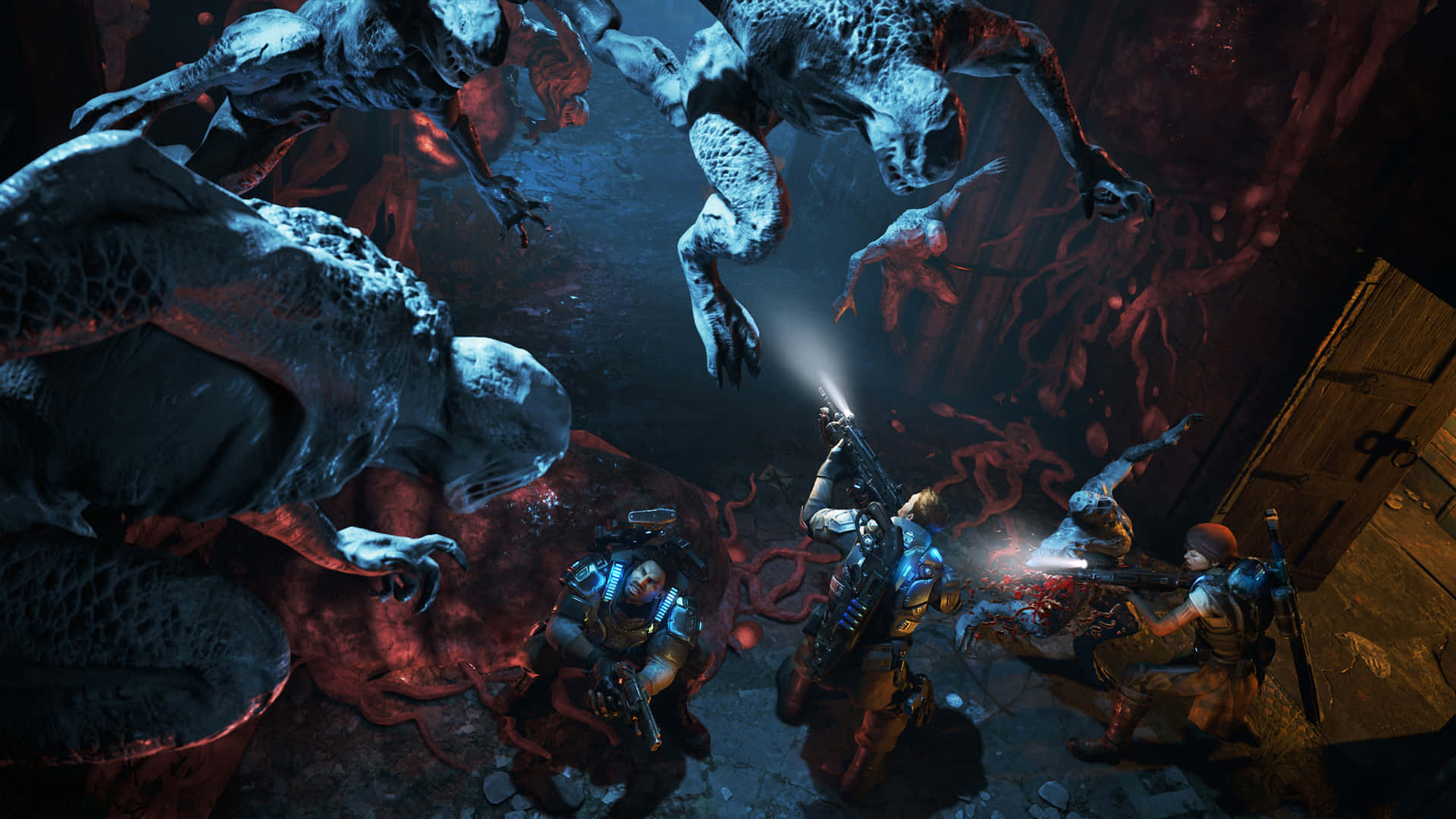 A Group Of People In A Dark Cave With A Monster