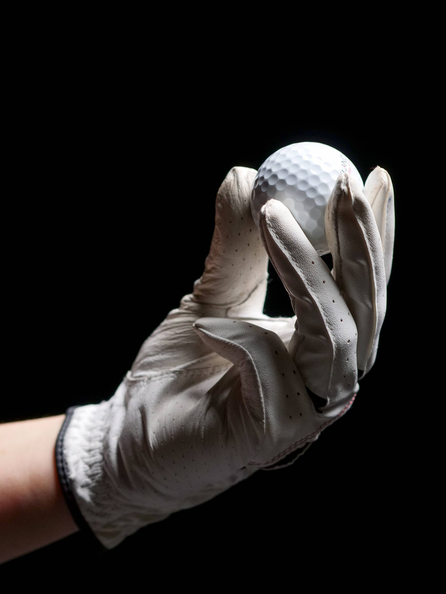 4k Hand Holding Golf Ball Wallpaper