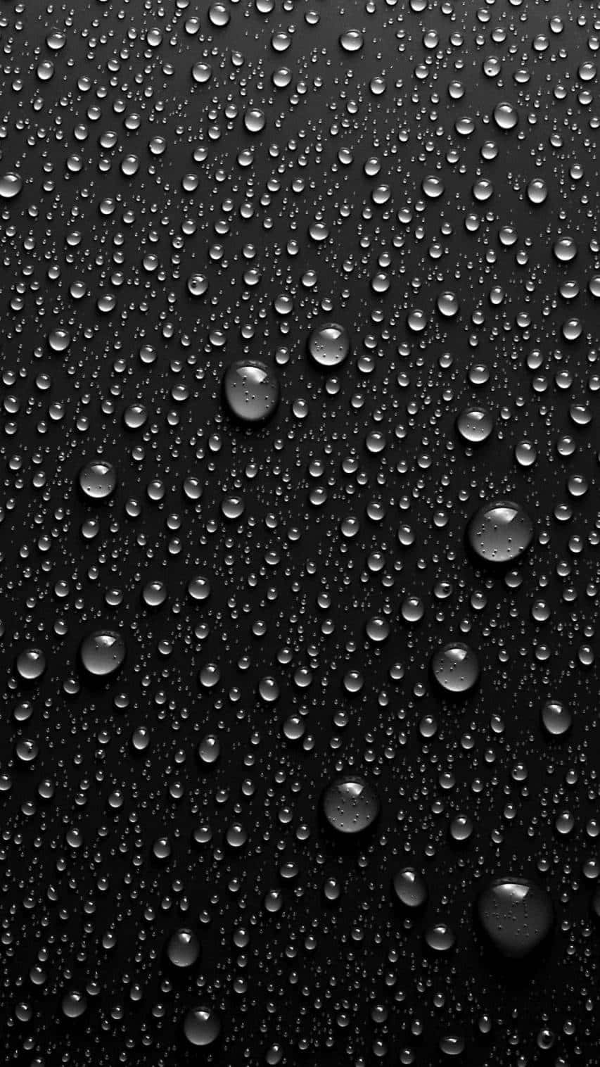 Water Drops On A Black Background Wallpaper
