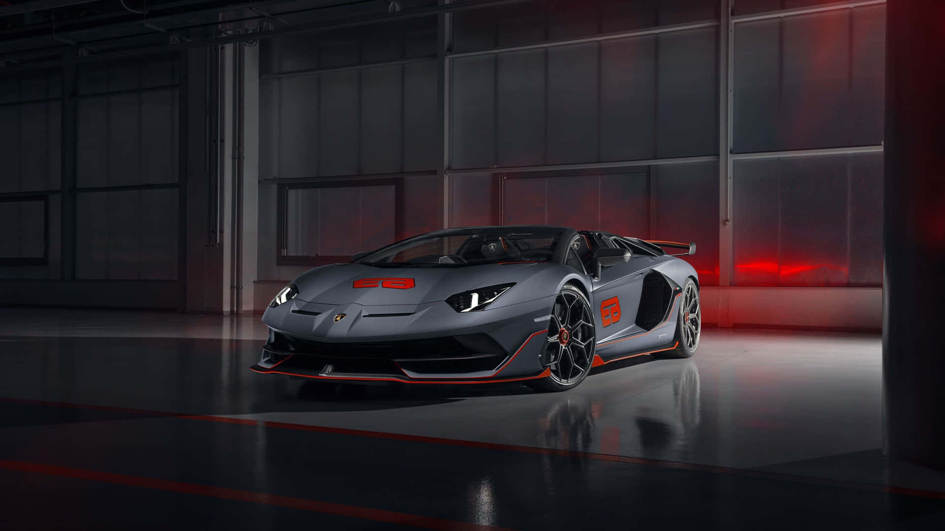 The Lamborghini Huracan Gts Is Shown In A Dark Room