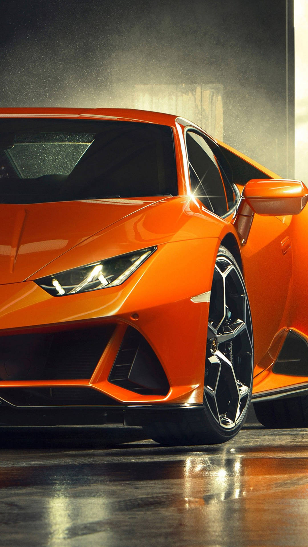 The Orange Sports Car Is Parked In A Garage Wallpaper
