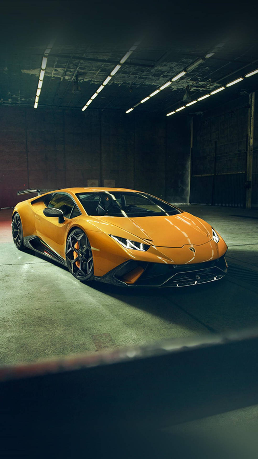 Nyd luksus kørsel med denne sporty 4k Lamborghini iPhone. Wallpaper