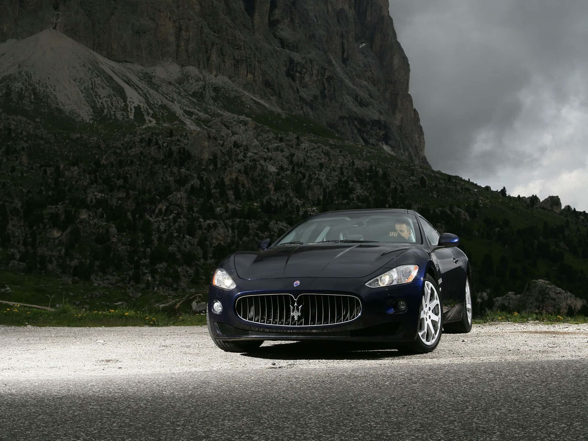 Black Maserati On A Cliff 4K Wallpaper