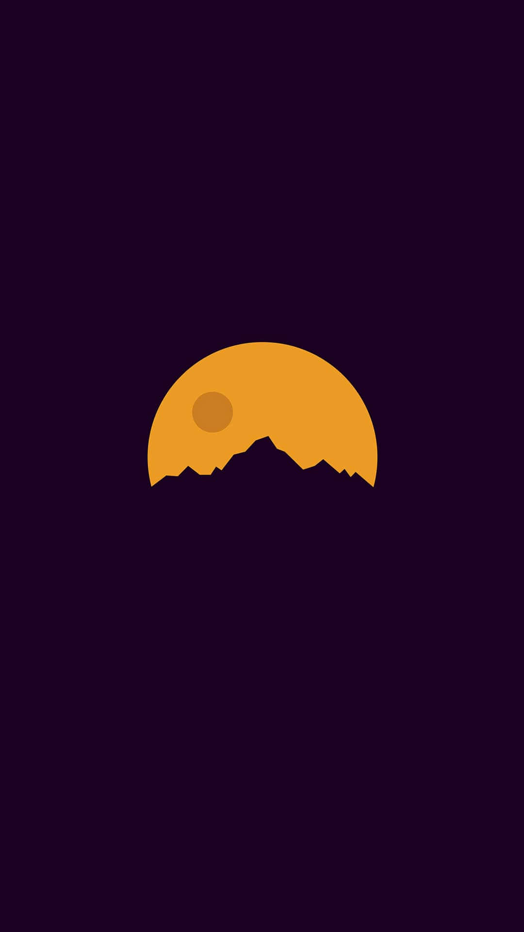 A Mountain Silhouette With A Sunset Behind It Wallpaper