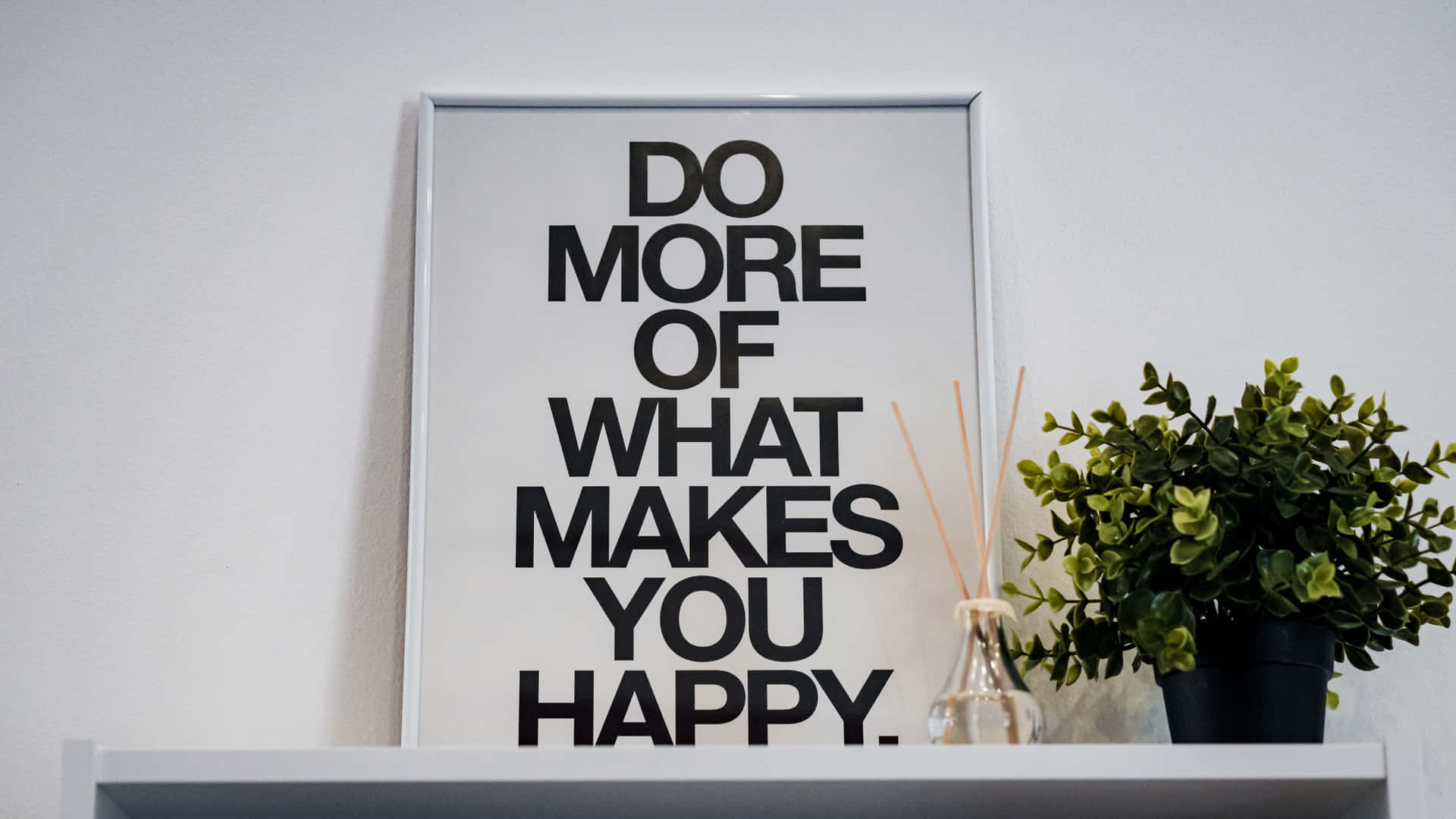 Gør mere af det, der gør dig glad. Wallpaper