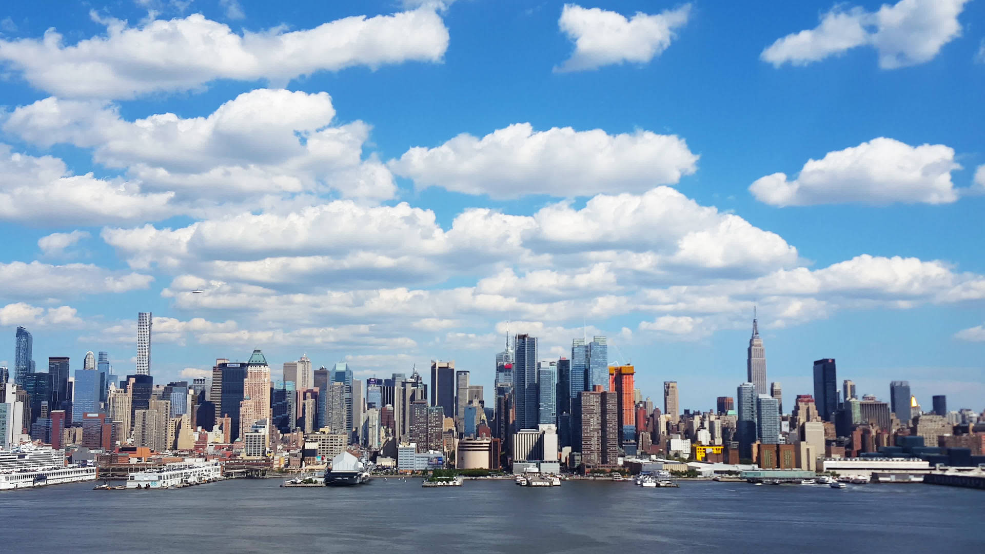 Fluffy Clouds Over 4k New York City Wallpaper