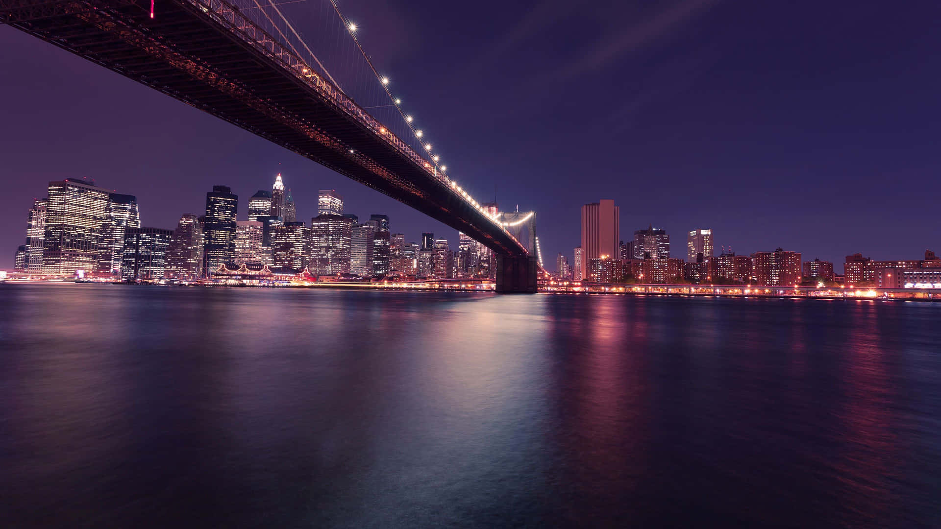 Capturandoel Deslumbrante Brillo De La Ciudad De Nueva York Por La Noche. Fondo de pantalla