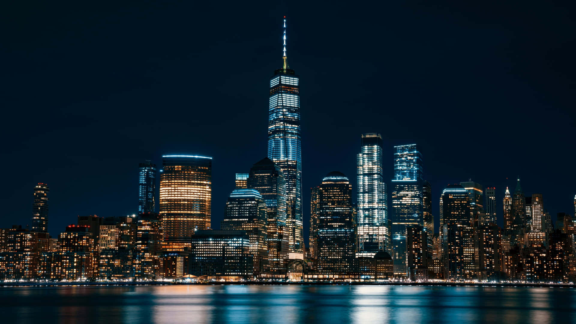 Deslumbrantesluces Nocturnas De La Ciudad De Nueva York. Fondo de pantalla
