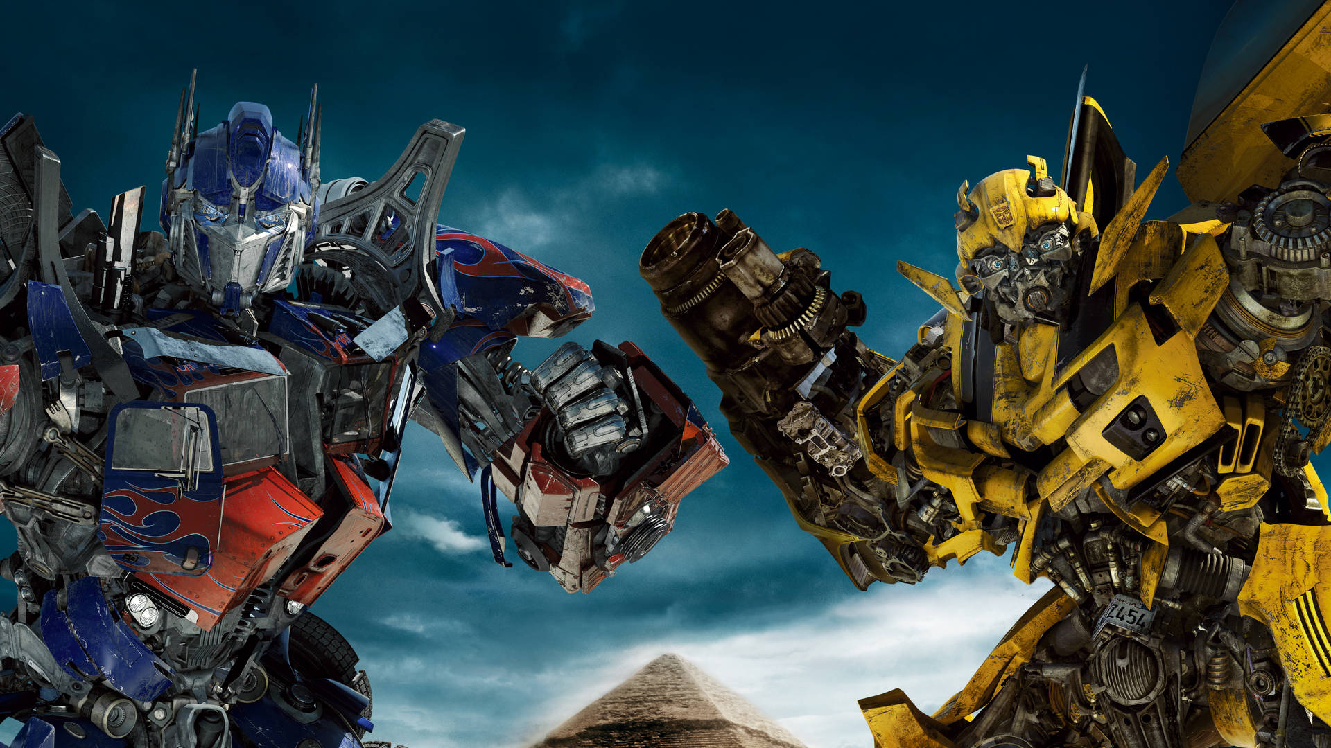 4k Ultra Hd Transformers Optimus And Bumblebee Wallpaper