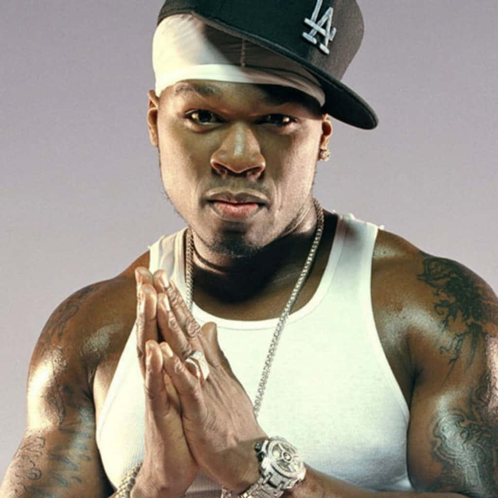 Download 50 Cent showing off a winning smile | Wallpapers.com