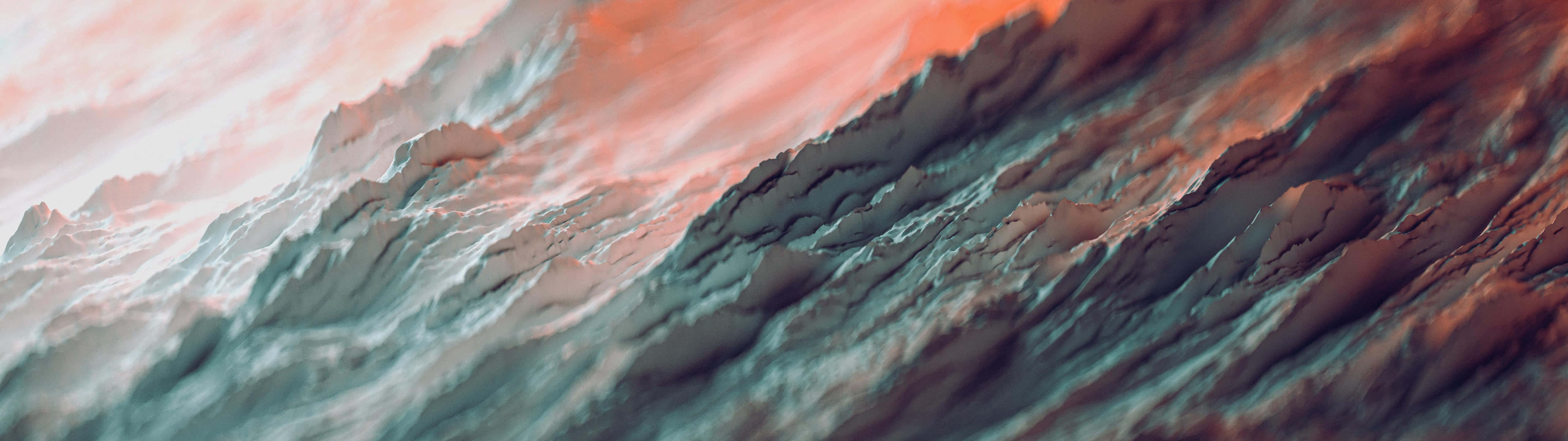 Unafoto De Una Montaña Con Un Cielo Rojo Y Naranja Fondo de pantalla