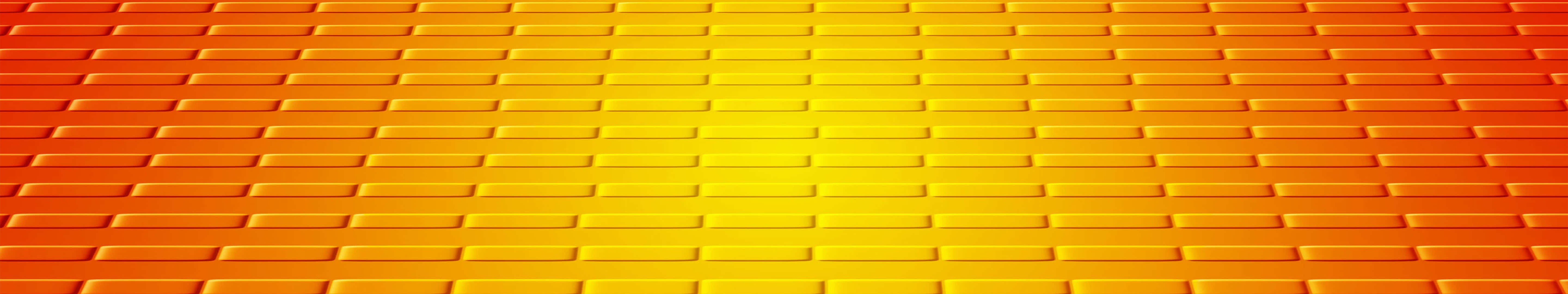 A Brick Wall With Orange And Yellow Bricks
