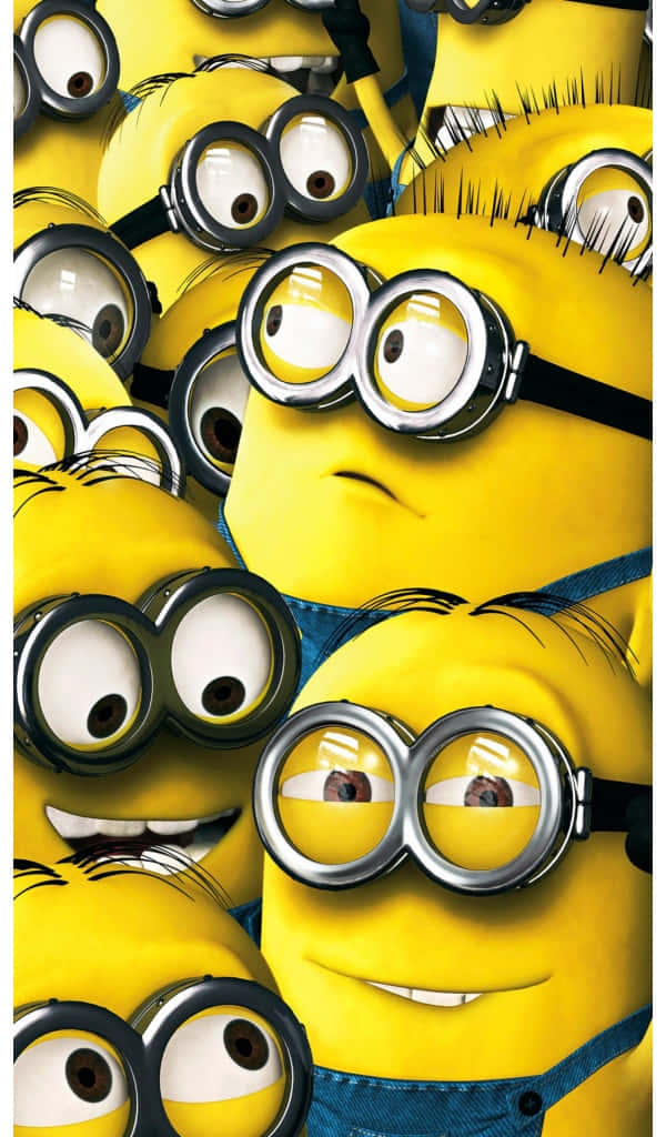 A Group Of Minions With Their Eyes Wide Open Wallpaper