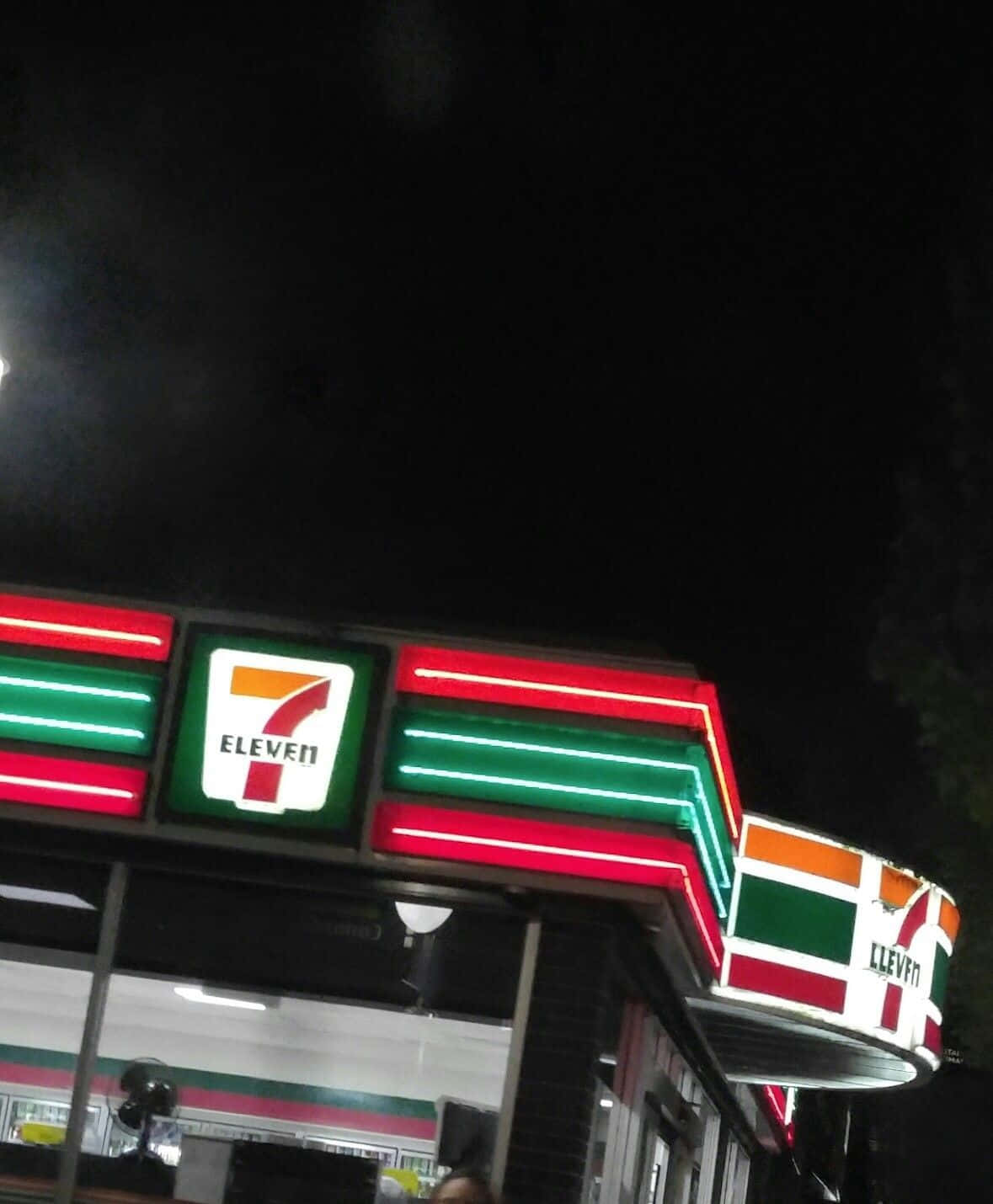 A 7-eleven Store Is Lit Up At Night