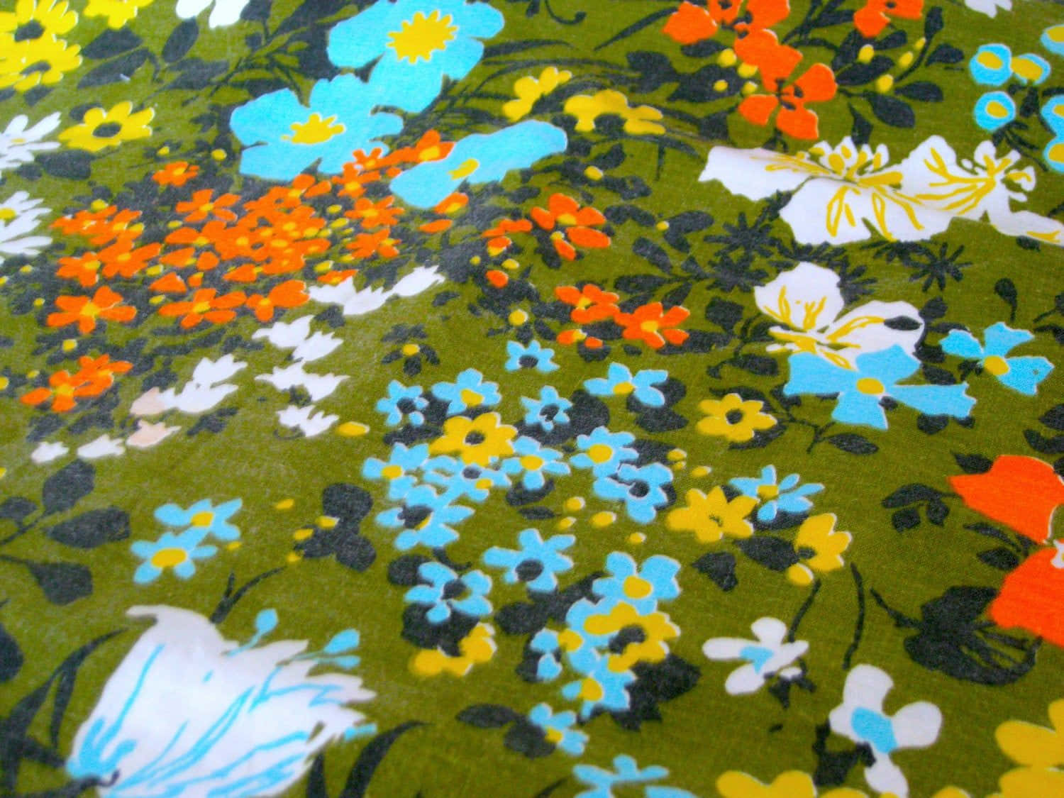 En grøn og blå blomstermønster Wallpaper