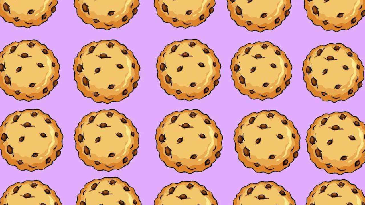 A Pattern Of Cookies On A Purple Background