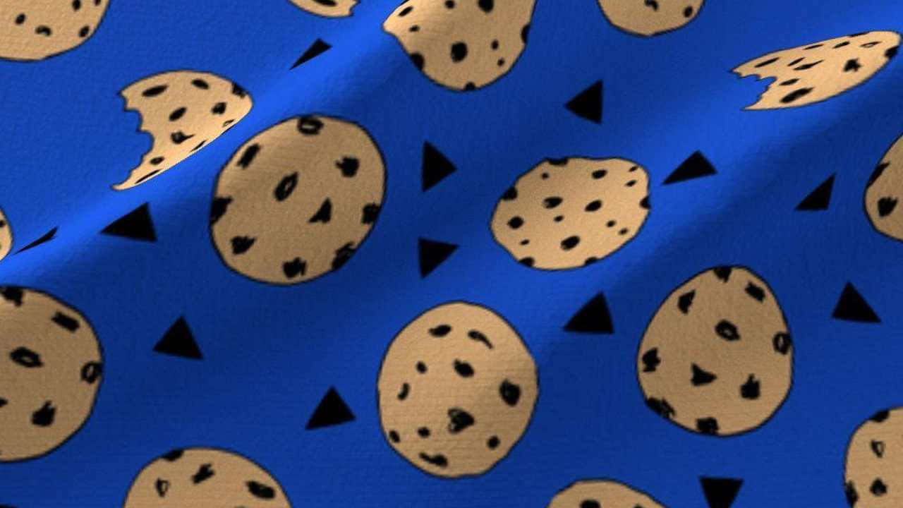 A Blue Fabric With Cookies On It