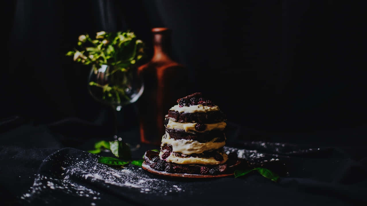 A Chocolate Cake With A Bottle Of Wine On Top