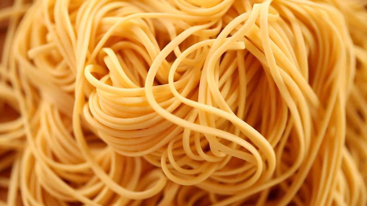 A Close Up Of A Bowl Of Noodles